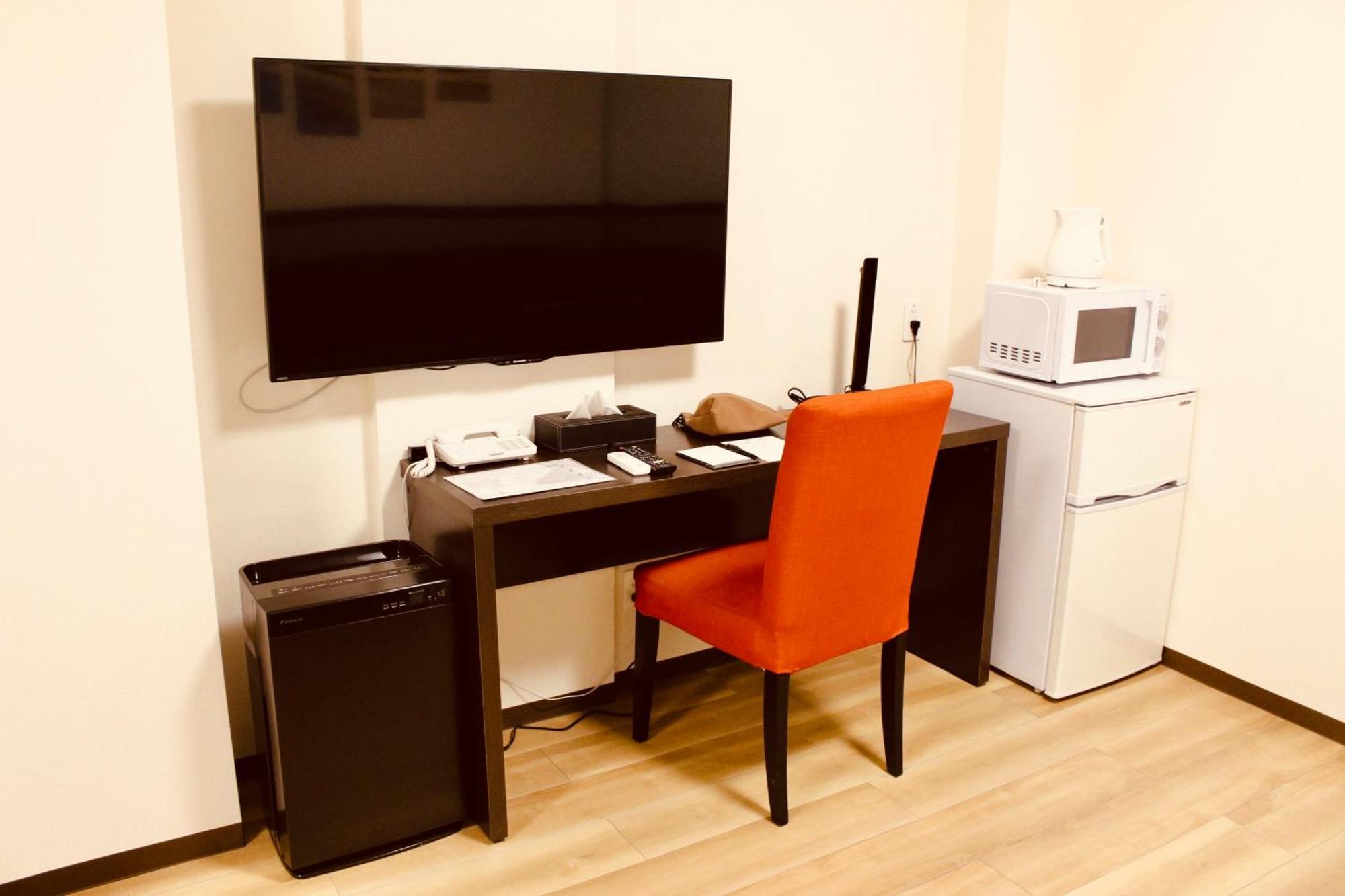 Phoenix Park Hotel Наґо Номер фото